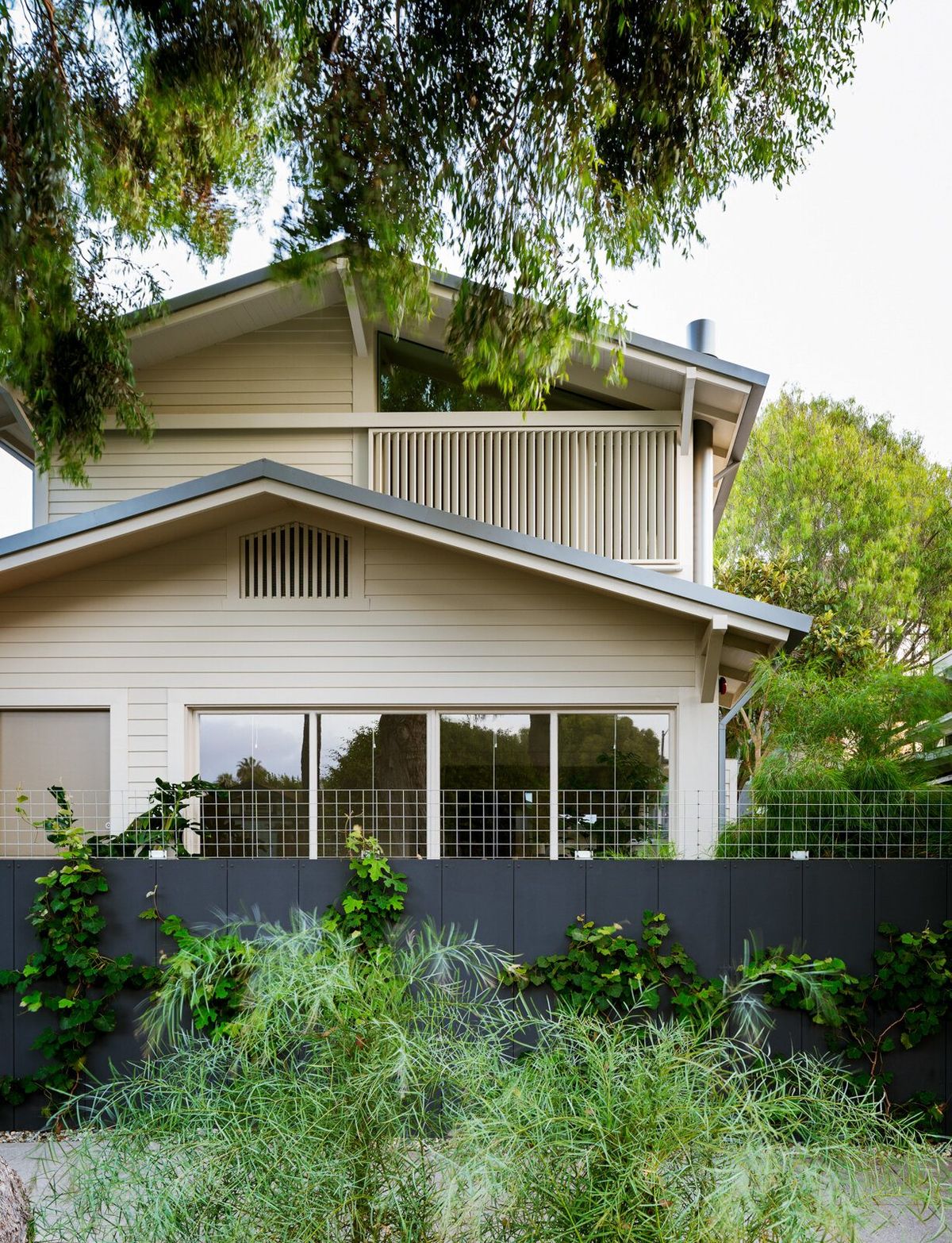 Altair: Street view of the Craftsman bungalow and its planted front yard