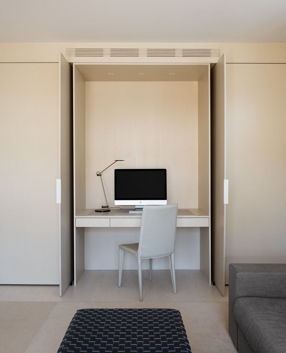 Harbor: Built-in desk alcove within pale oak cabinetry