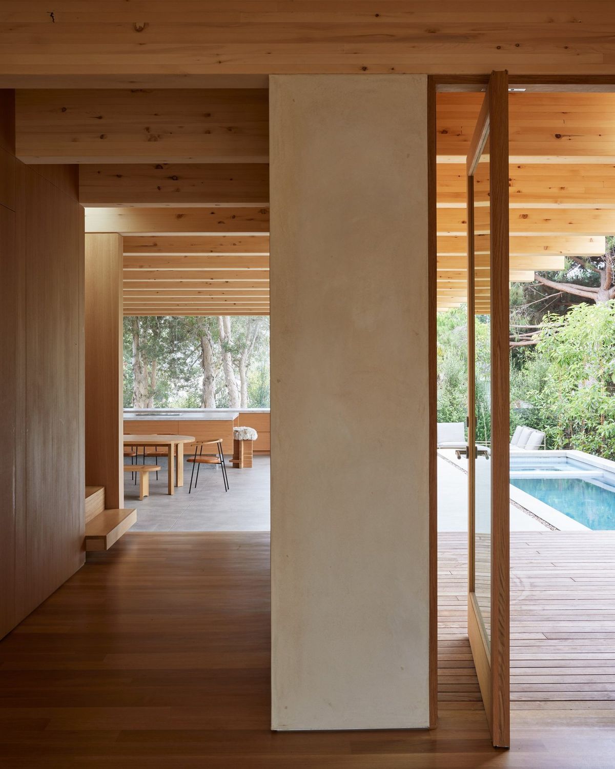 Meier: Plaster column and timber framing opening to the pool deck