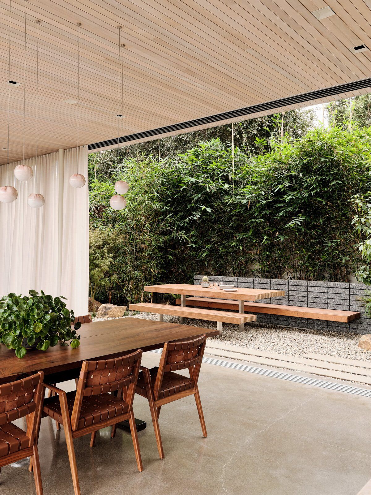Modjeska: Dining table and chairs opening to the garden patio
